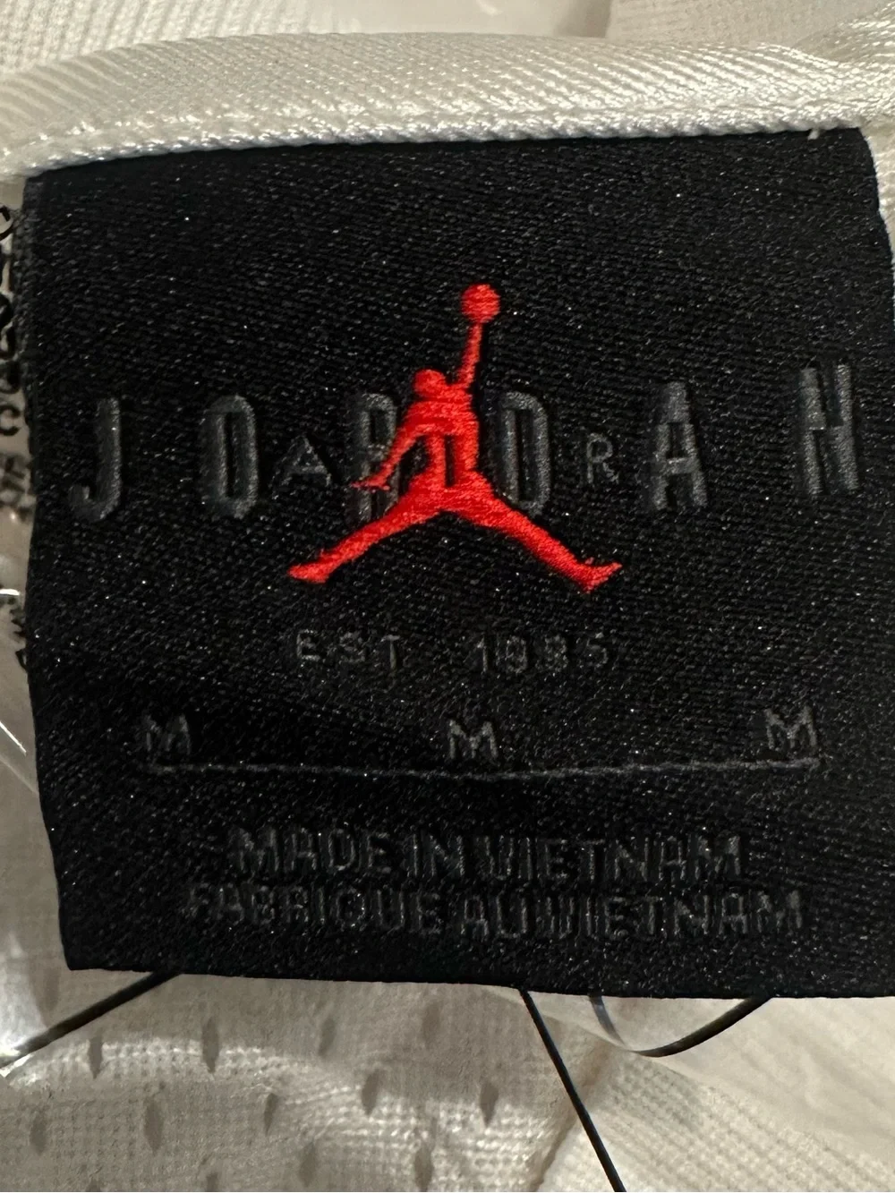 Nike Bike Air Jordan Black Tag with Red Jumpman Logo.